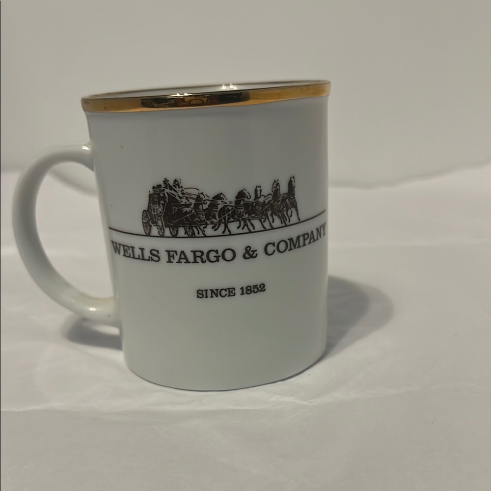 White with Gold Rim vintage Wells Fargo & Company Coffee Cup.